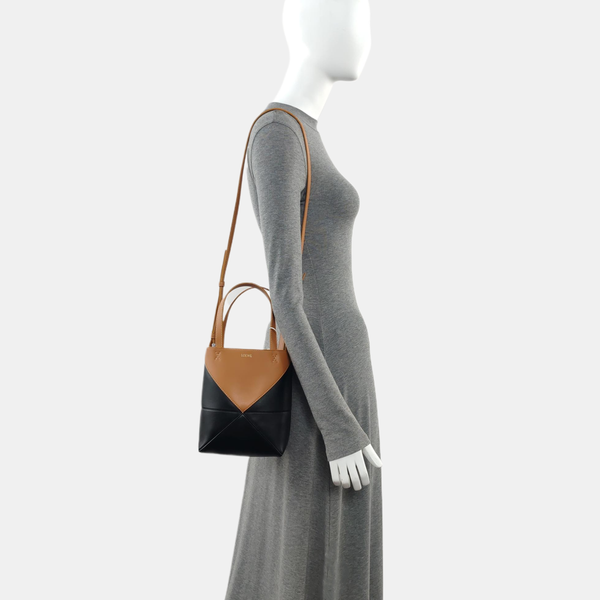 Authenticated pre-owned  Puzzle Fold Mini Calfskin Black - Tote Bag at Looply