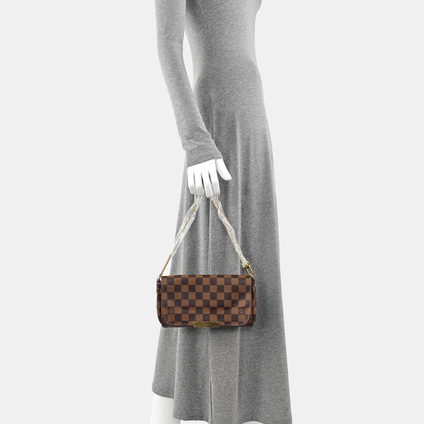 FAVORITE PM Damier Ebene Coated Canvas Brown