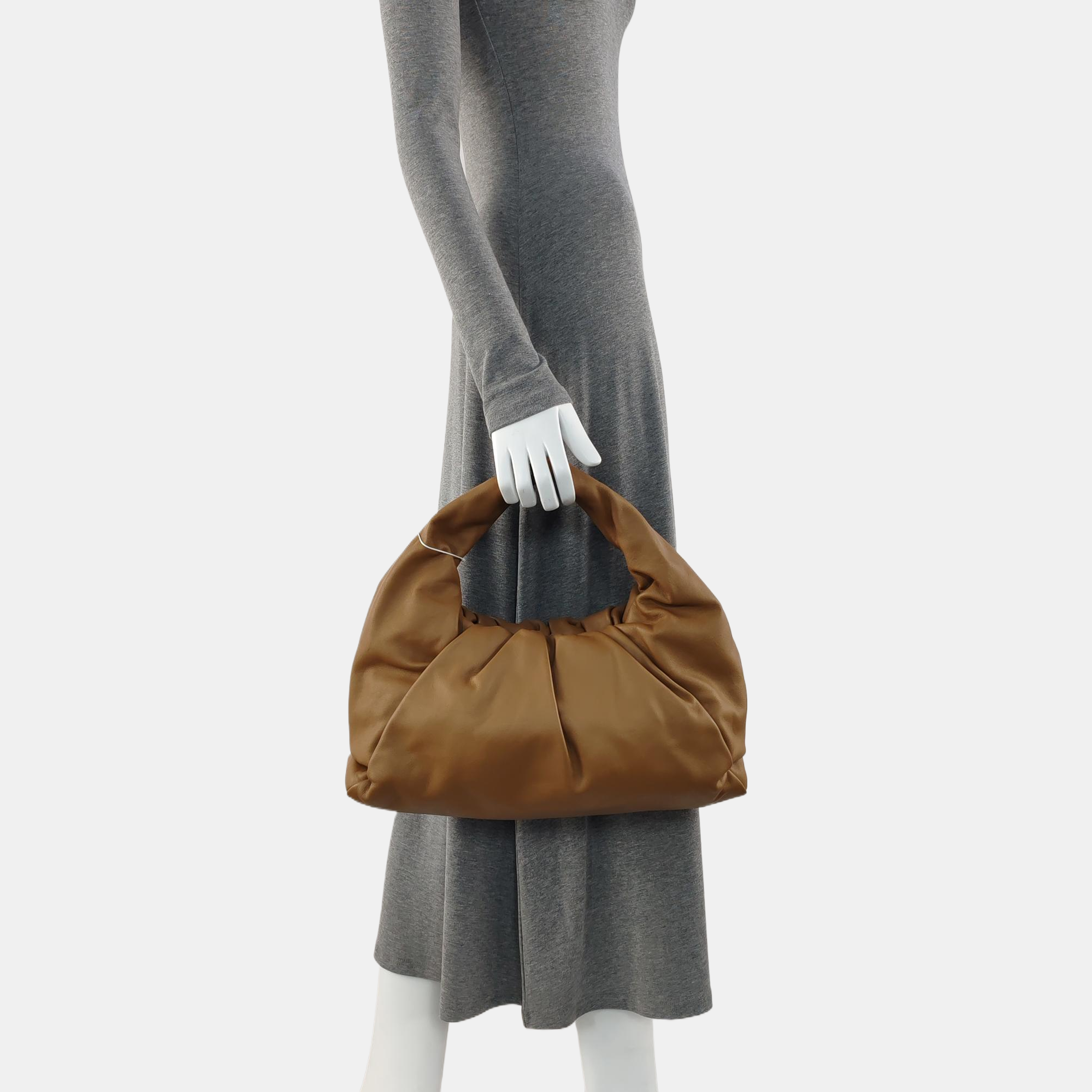 Authenticated pre-owned  The Pouch Calfskin Brown - Top Handle Bag at Looply