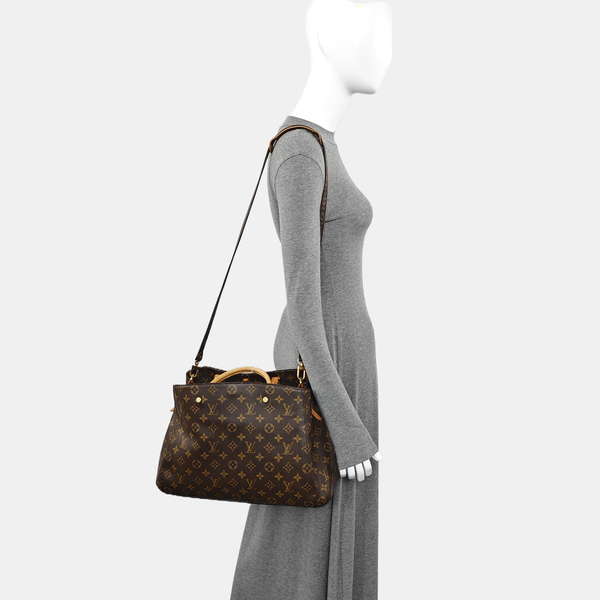 MONTAIGNE GM Monogram Coated Canvas Brown