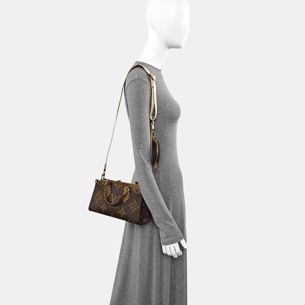 ONTHEGO EAST WEST PM Monogram Coated Canvas Brown