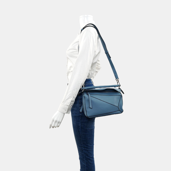 Authenticated pre-owned  Puzzle Small Calfskin Blue - Shoulder Bag at Looply