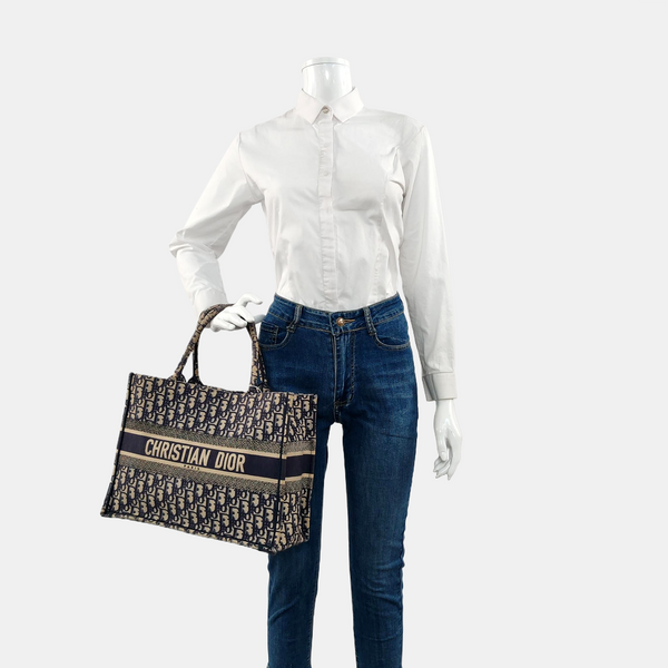 Authenticated pre-owned  Book Tote Medium Canvas Blue - Tote Bag at Looply