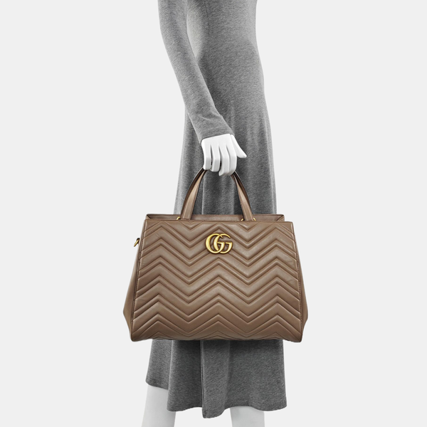 Authenticated pre-owned  GG Marmont Quilted Calfskin Beige - Tote Bag at Looply