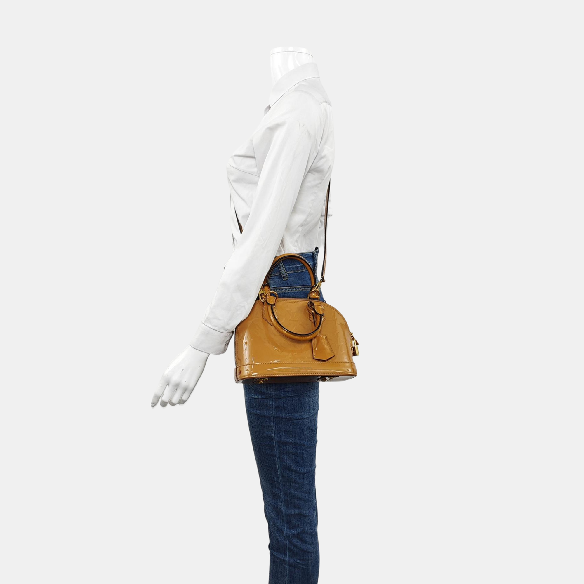 Authenticated pre-owned  ALMA Monogram Patent Leather Yellow - Shoulder Bag at Looply