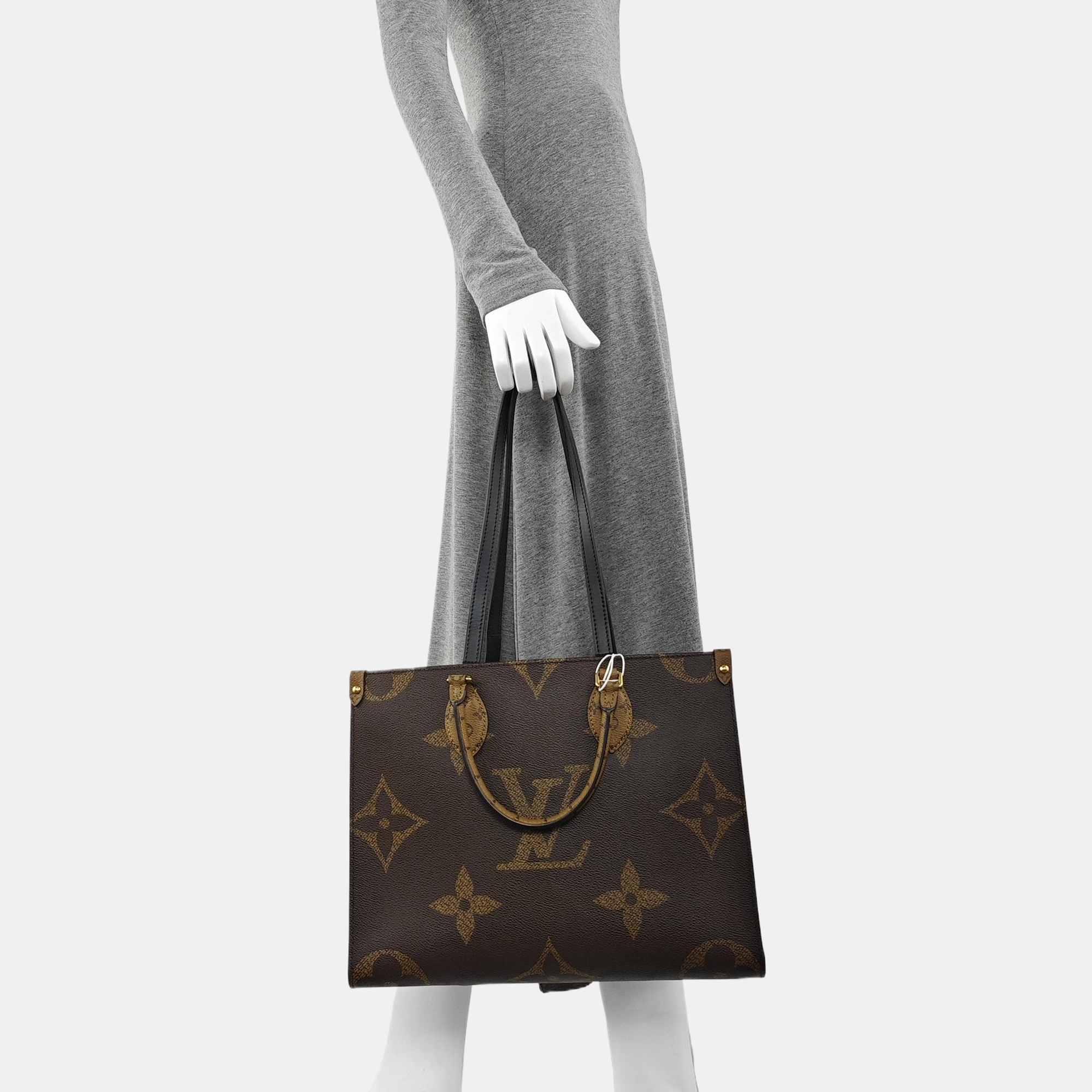 ONTHEGO MM Monogram Coated Canvas Brown