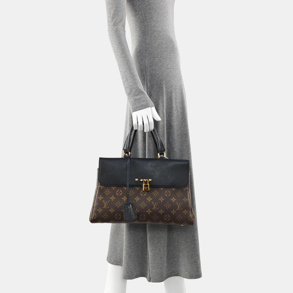 VÉNUS Monogram Coated Canvas Brown