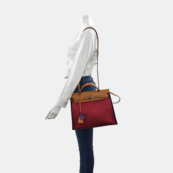 Authenticated pre-owned  Herbag 31 Canvas Red - Shoulder Bag at Looply
