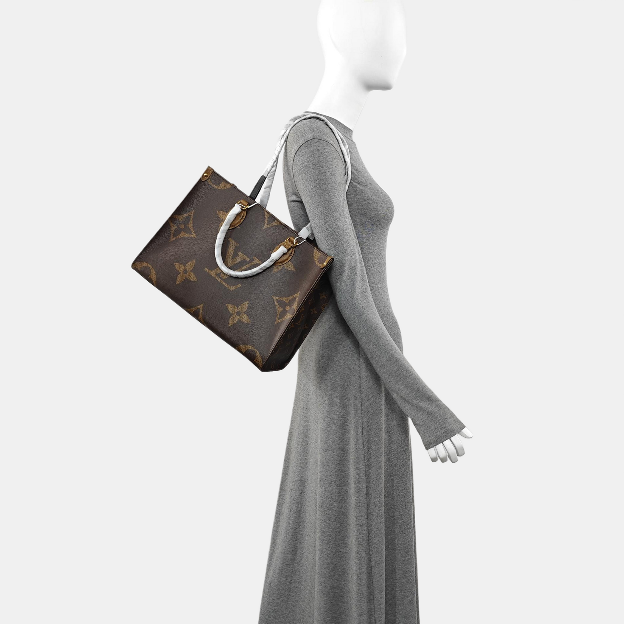 ONTHEGO MM Monogram Coated Canvas Brown