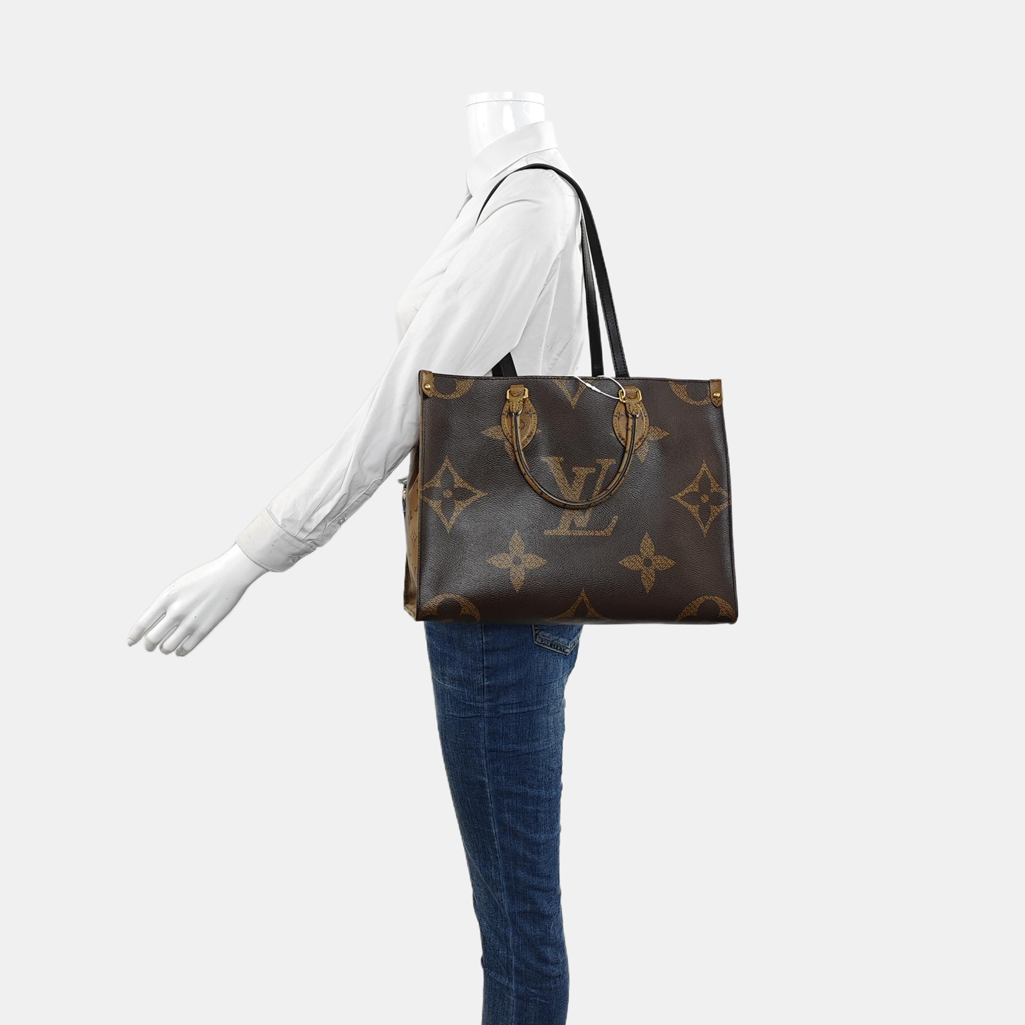 ONTHEGO MM Monogram Coated Canvas Brown