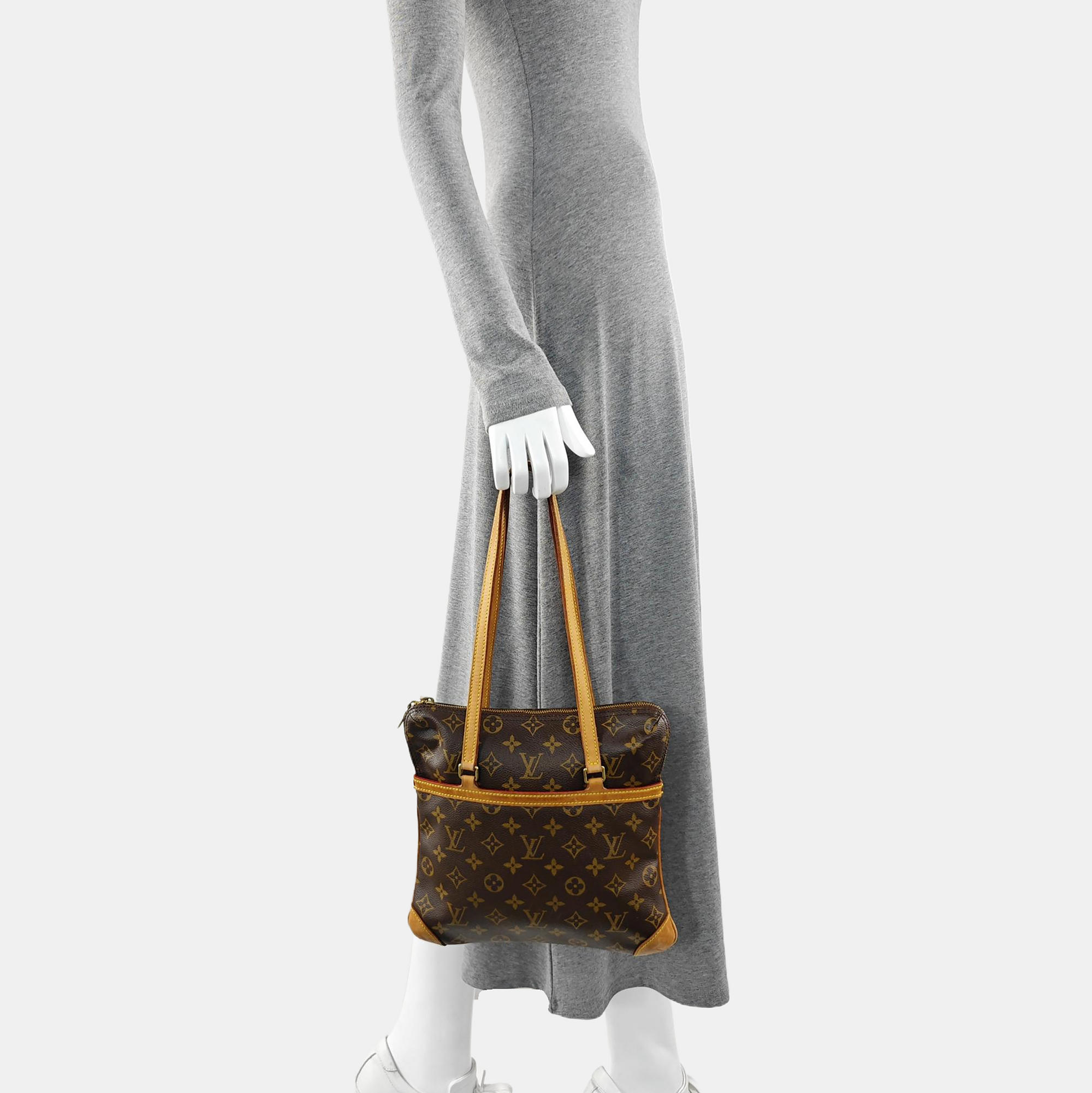 COUSSIN GM Monogram Coated Canvas Brown