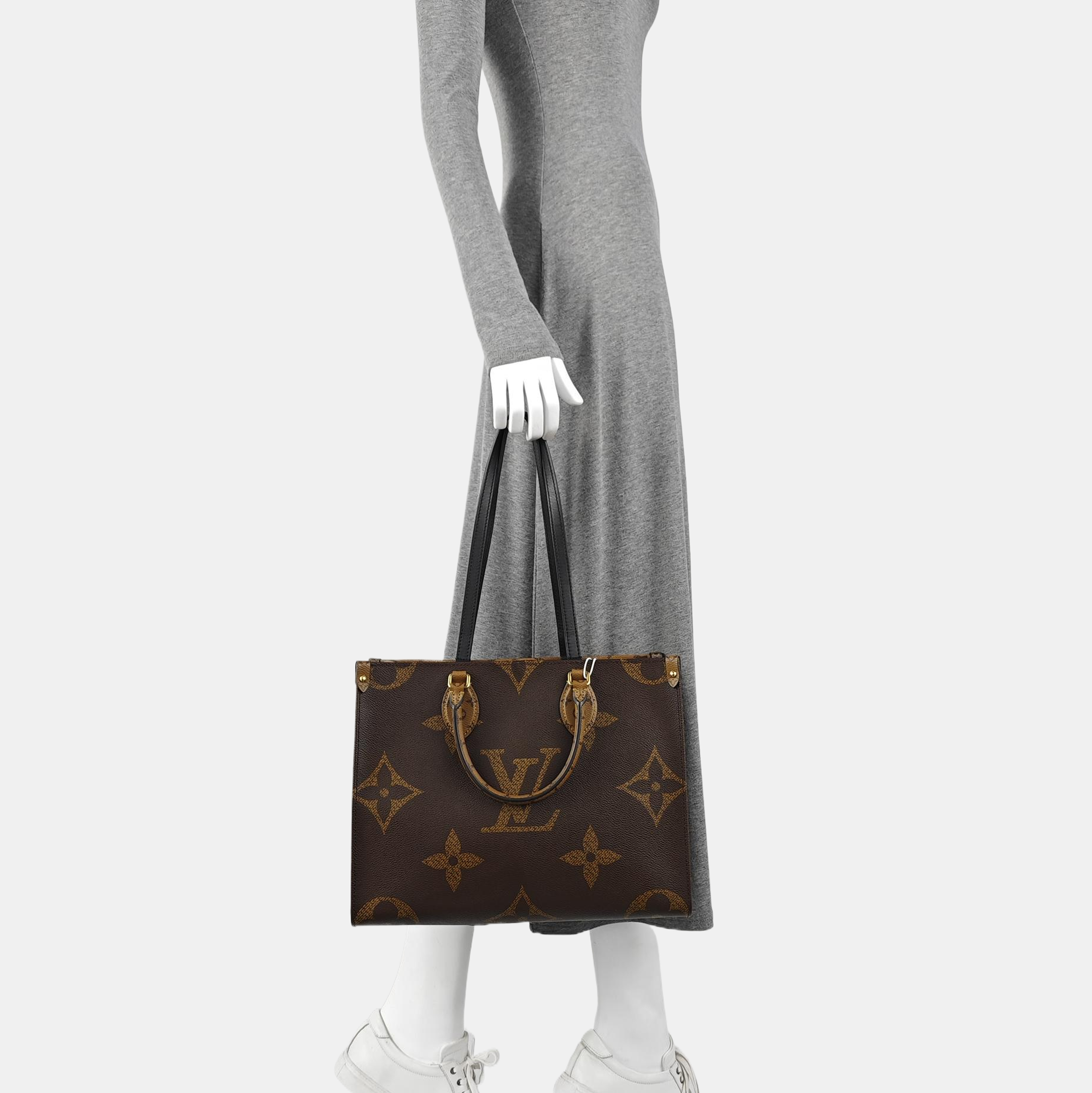 ONTHEGO MM Monogram Coated Canvas Brown