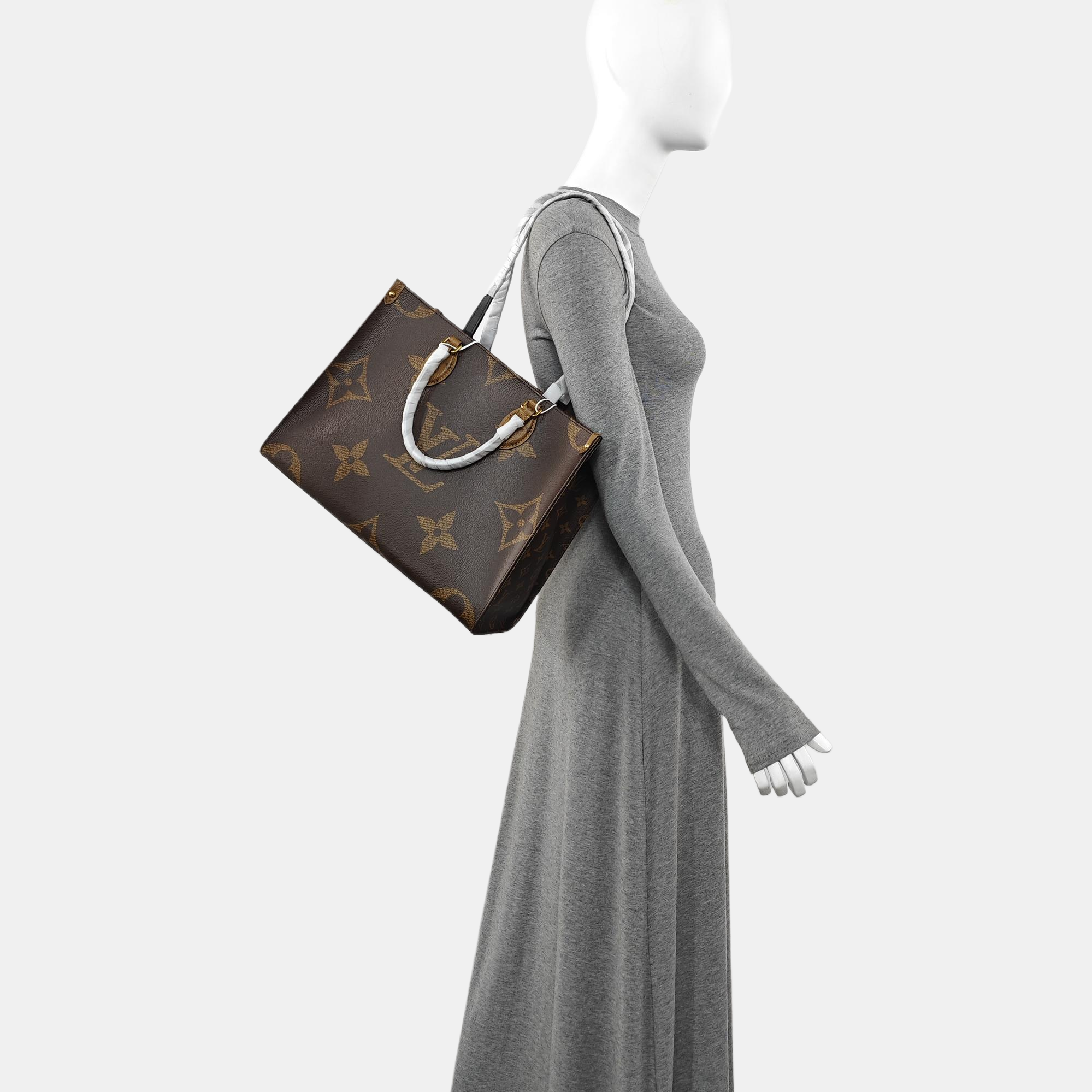 ONTHEGO MM Monogram Coated Canvas Brown