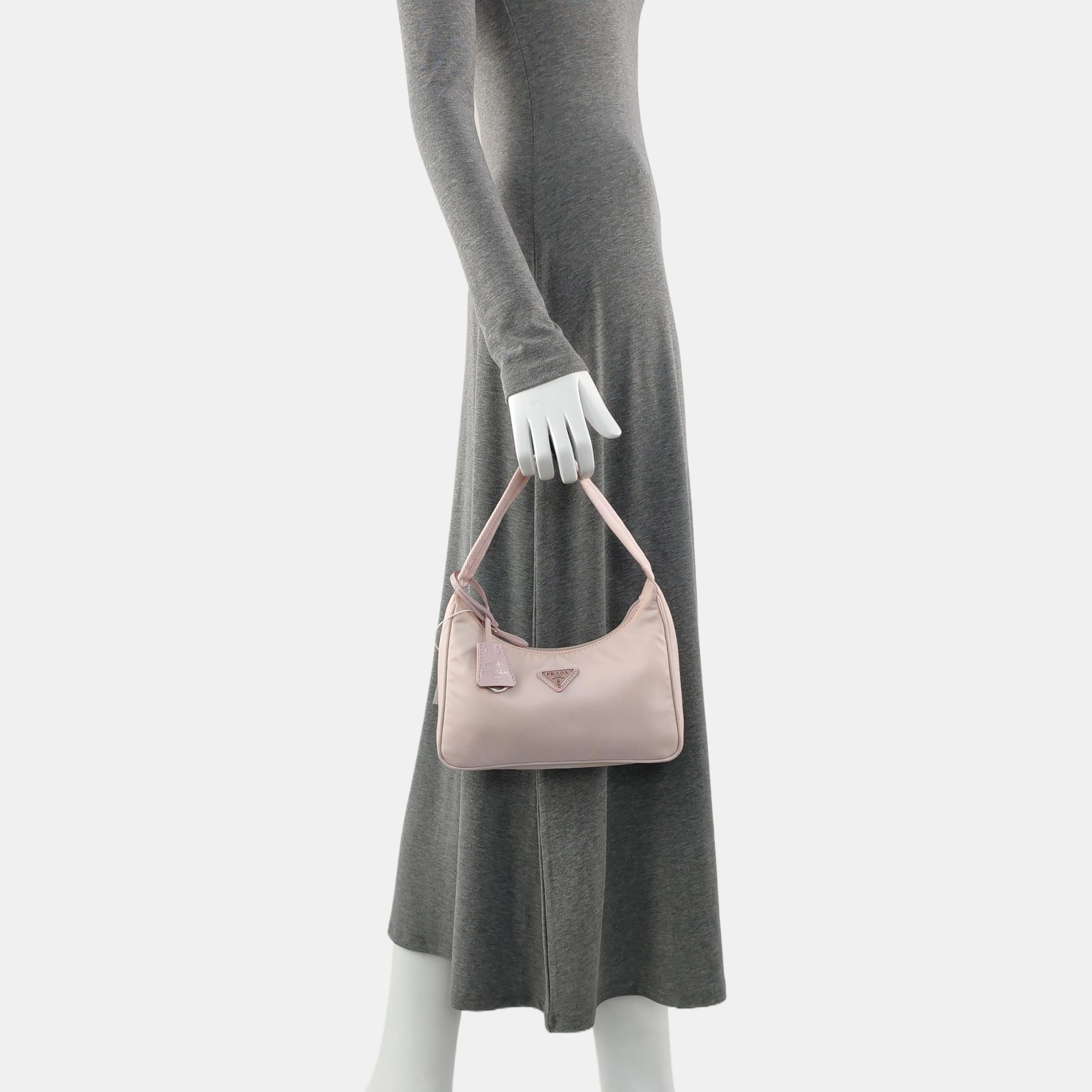 Authenticated pre-owned  Re-Edition Nylon Pink - Top Handle Bag at Looply