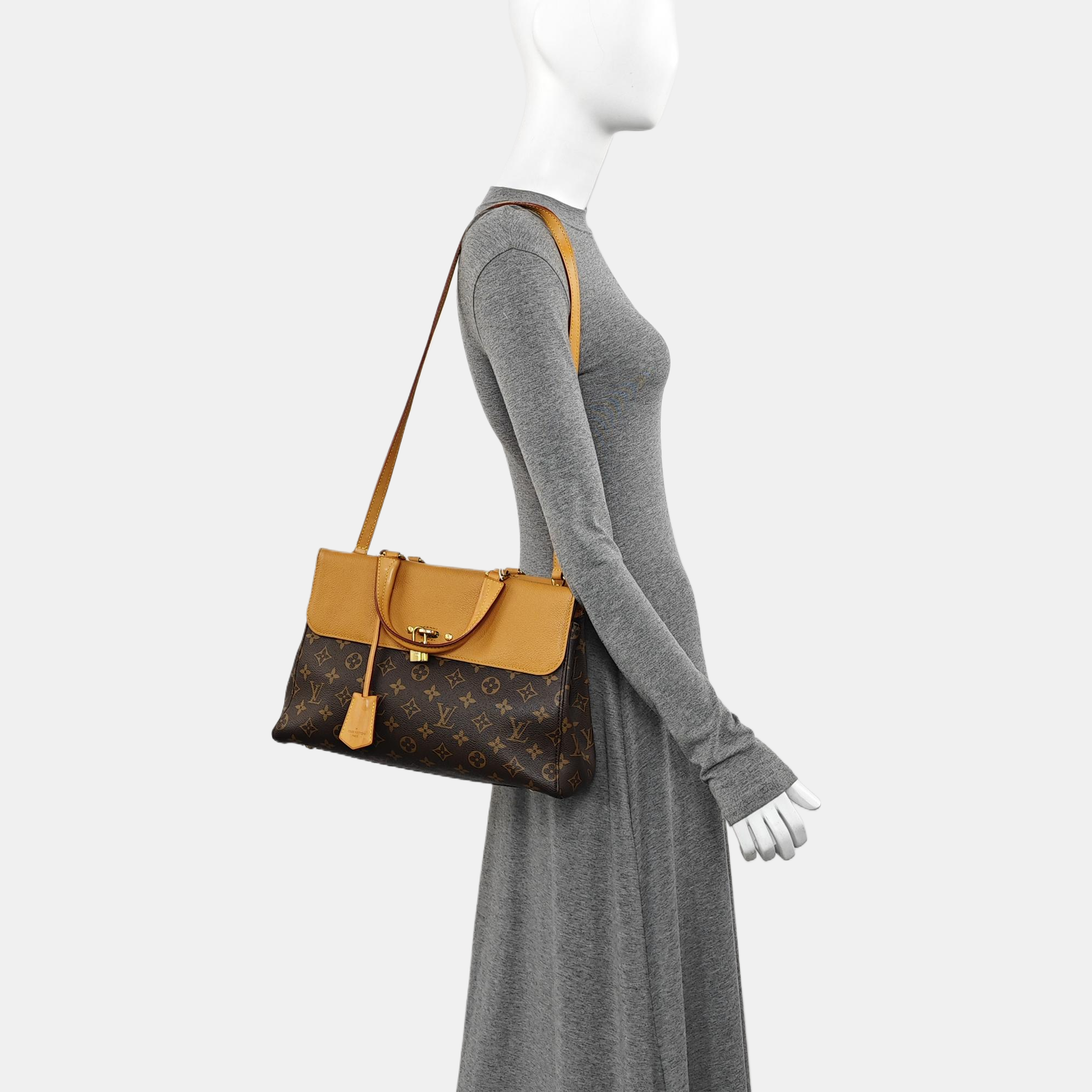 VÉNUS Monogram Coated Canvas Brown