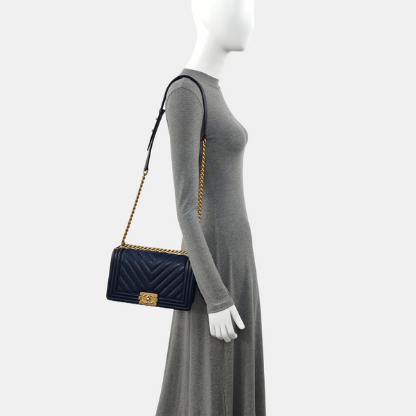 Authenticated pre-owned  BOY CHANEL Chevron, Quilted Grained Calfskin Blue - Crossbody Bag at Looply