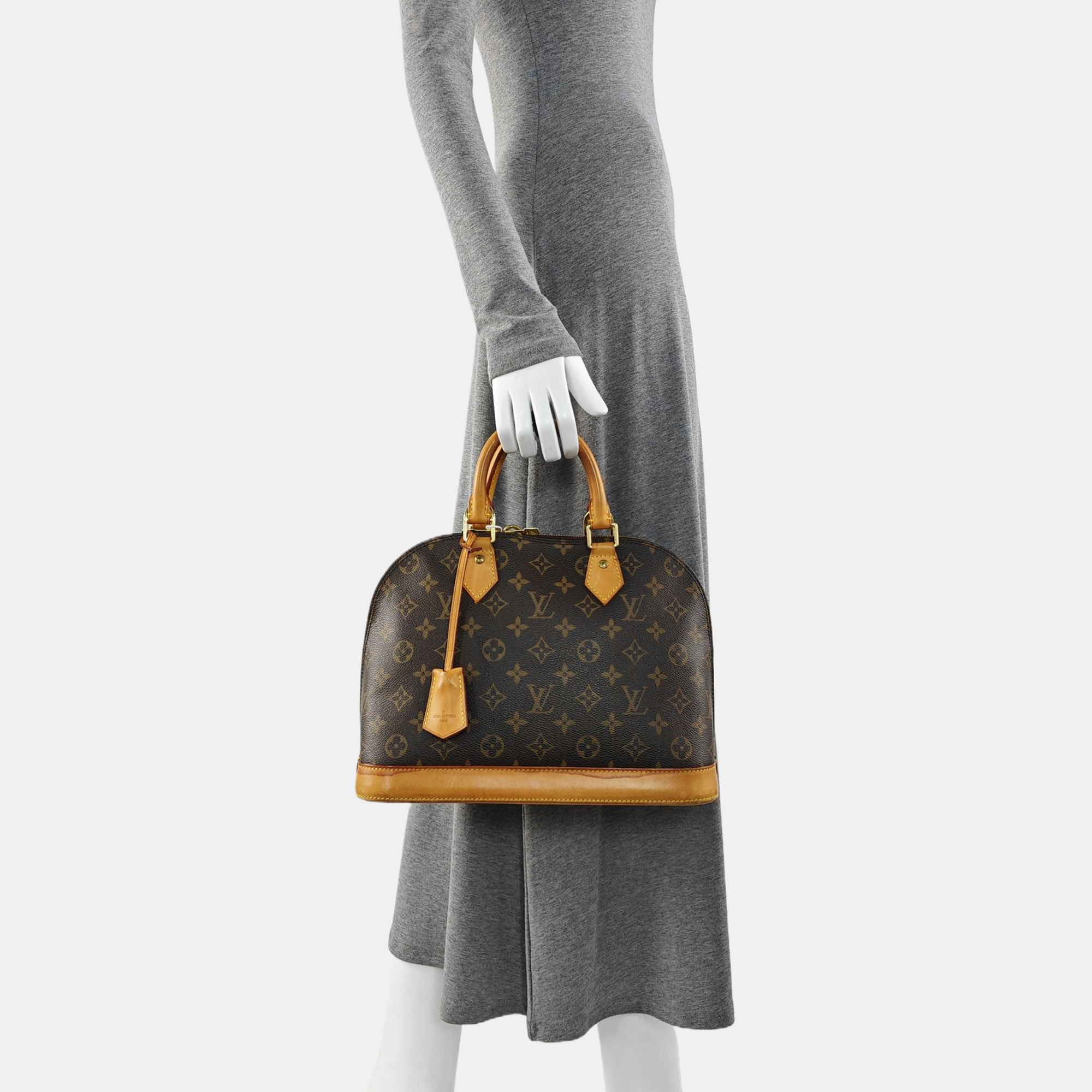 ALMA PM Monogram Coated Canvas Brown