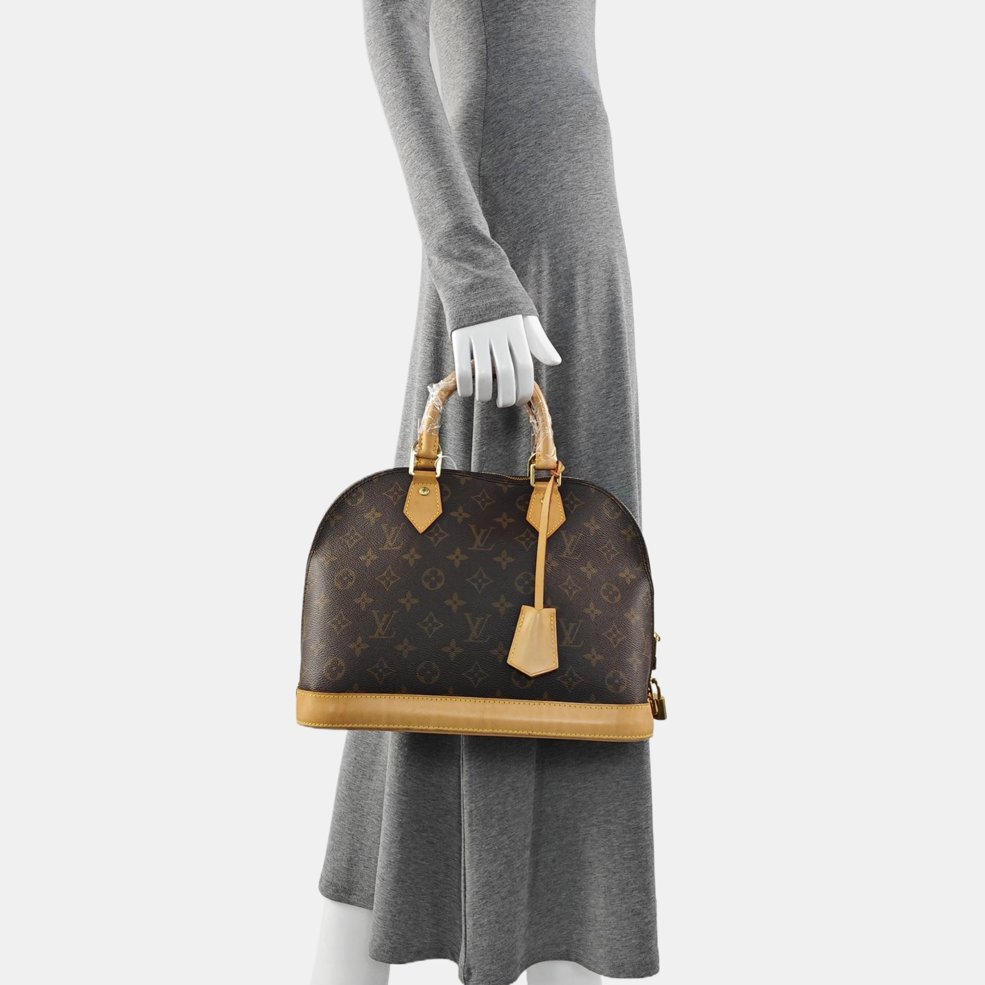 ALMA PM Monogram Coated Canvas Brown