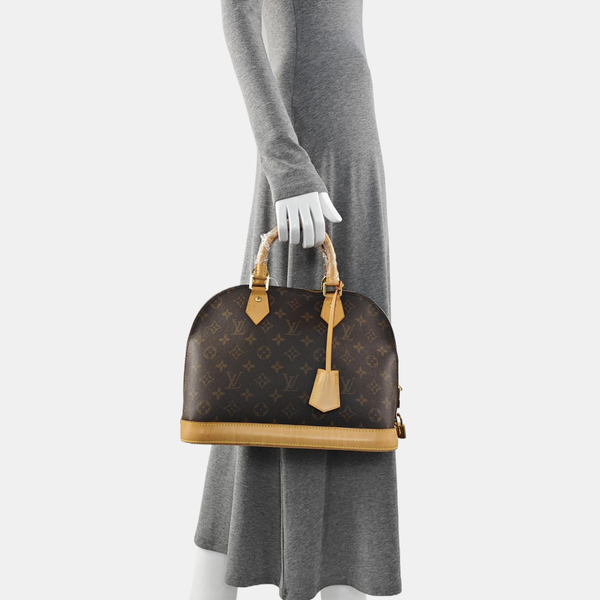 ALMA PM Monogram Coated Canvas Brown