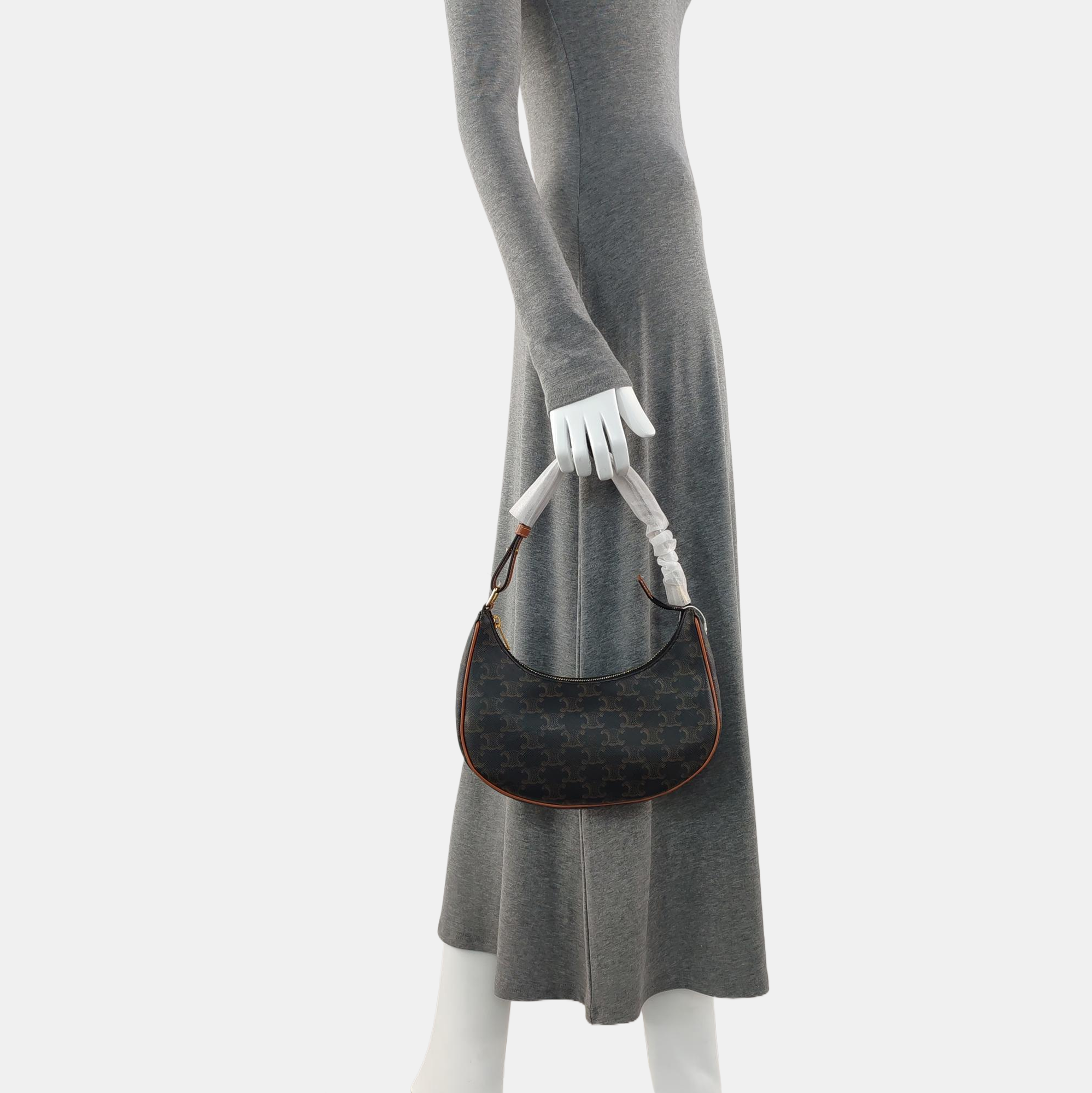 Authenticated pre-owned  AVA Coated Canvas Brown - Top Handle Bag at Looply