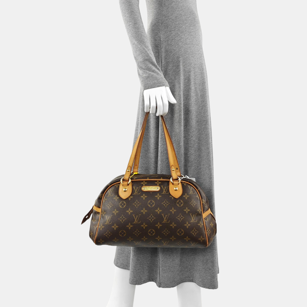 MONTORGUEI PM Monogram Coated Canvas Brown