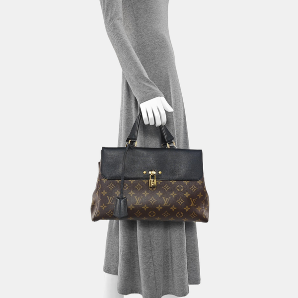 VÉNUS Monogram Coated Canvas Brown