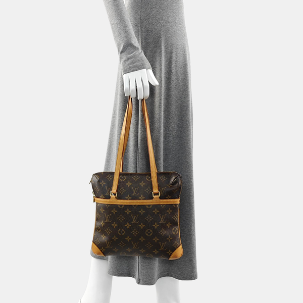 COUSSIN GM Monogram Coated Canvas Brown
