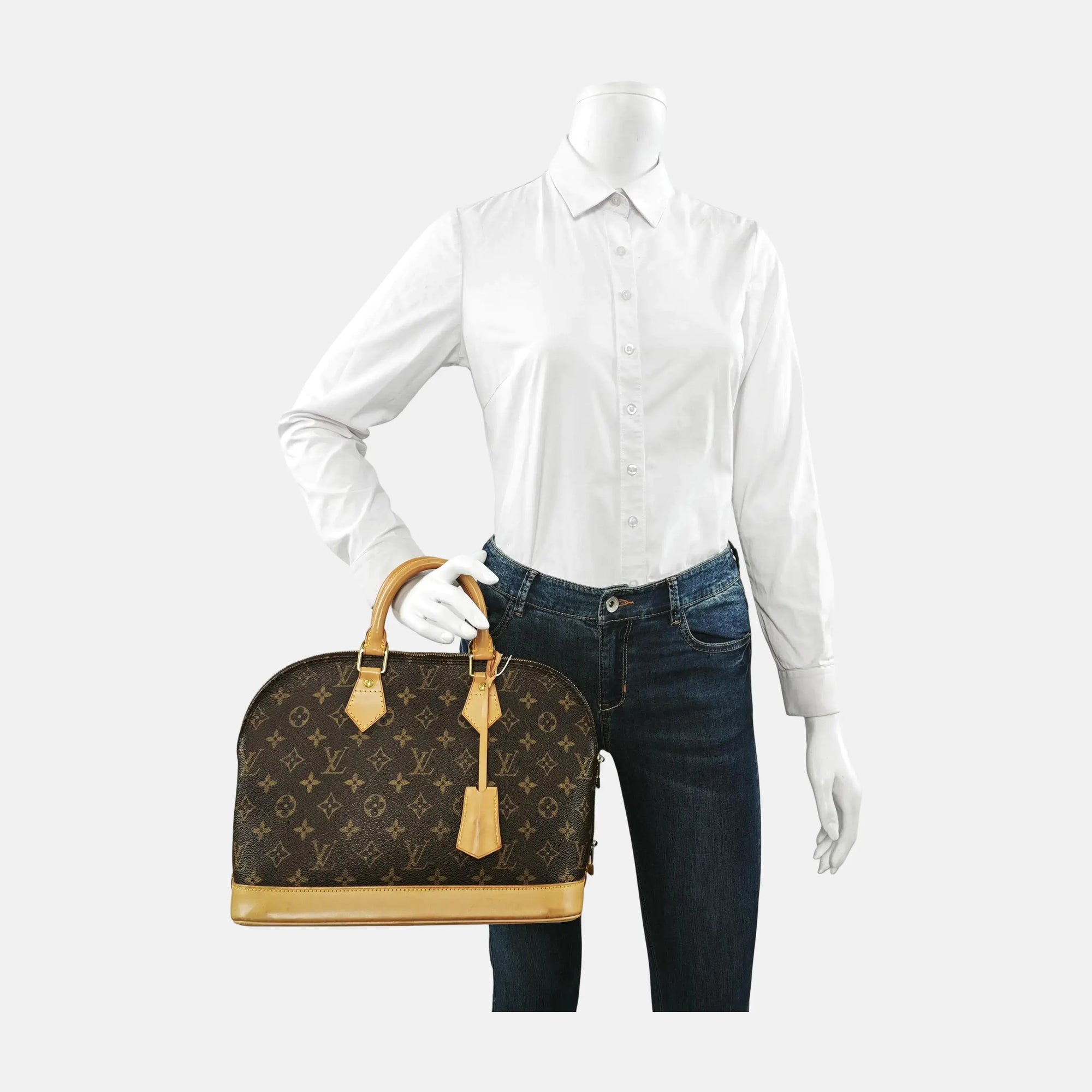 ALMA PM Monogram Coated Canvas Brown