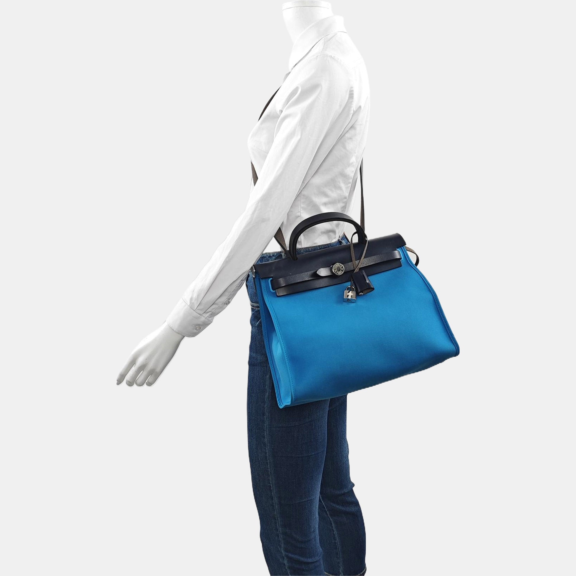 Authenticated pre-owned  Herbag 31 Canvas Blue - Shoulder Bag at Looply