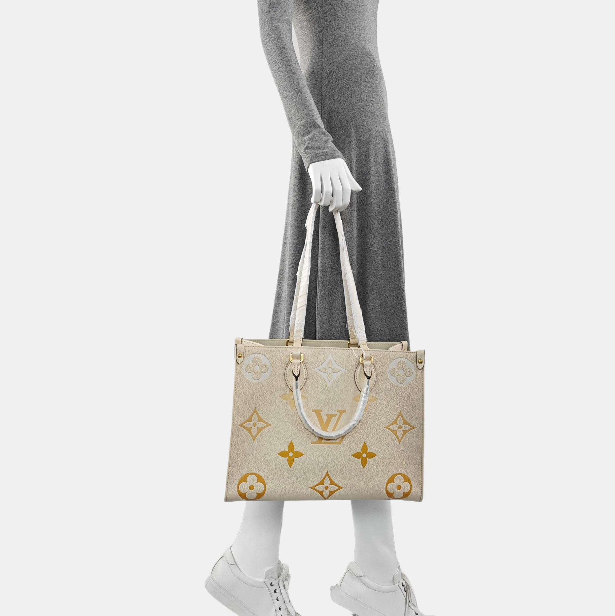 ONTHEGO MM Monogram Calfskin Beige