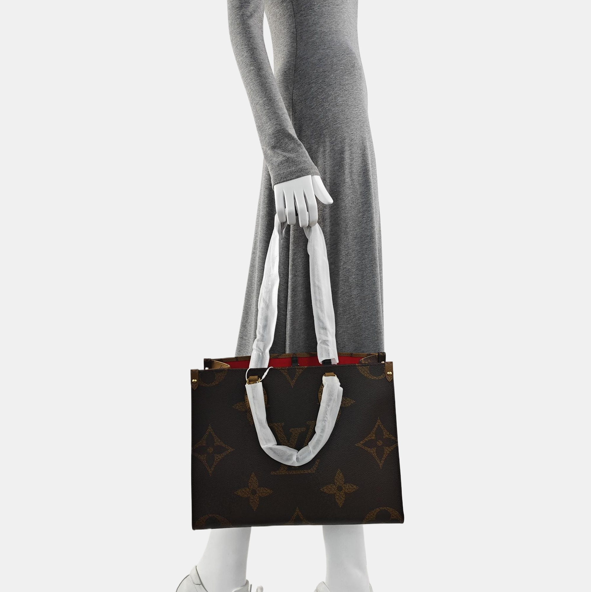 ONTHEGO MM Monogram Coated Canvas Brown