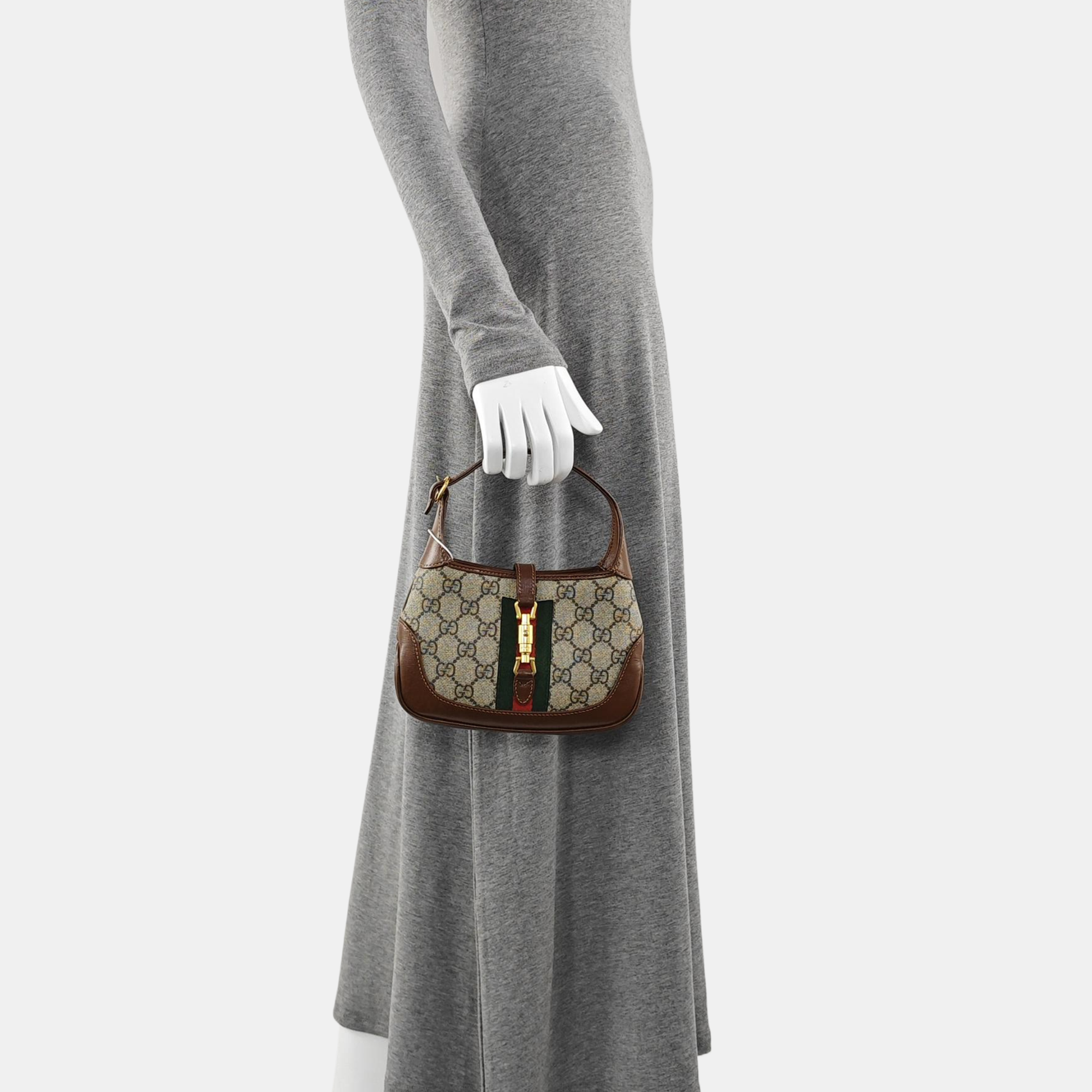 Authenticated pre-owned  Jackie 1961 Mini Monogram Coated Canvas Beige - Top Handle Bag at Looply