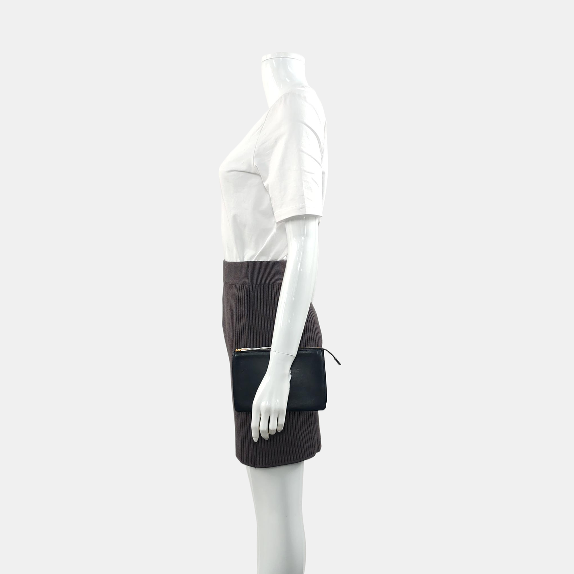 Authenticated pre-owned  TRIO Calfskin Black - Clutch at Looply