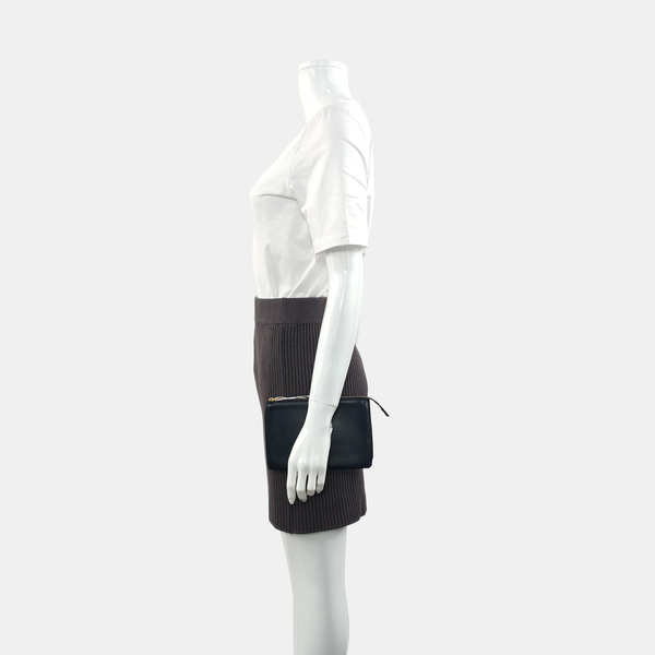 Authenticated pre-owned  TRIO Calfskin Black - Clutch at Looply