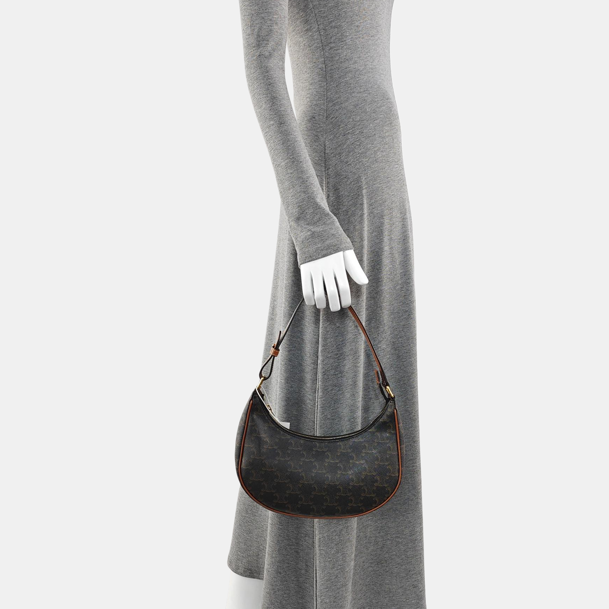 Authenticated pre-owned  AVA Coated Canvas Brown - Top Handle Bag at Looply