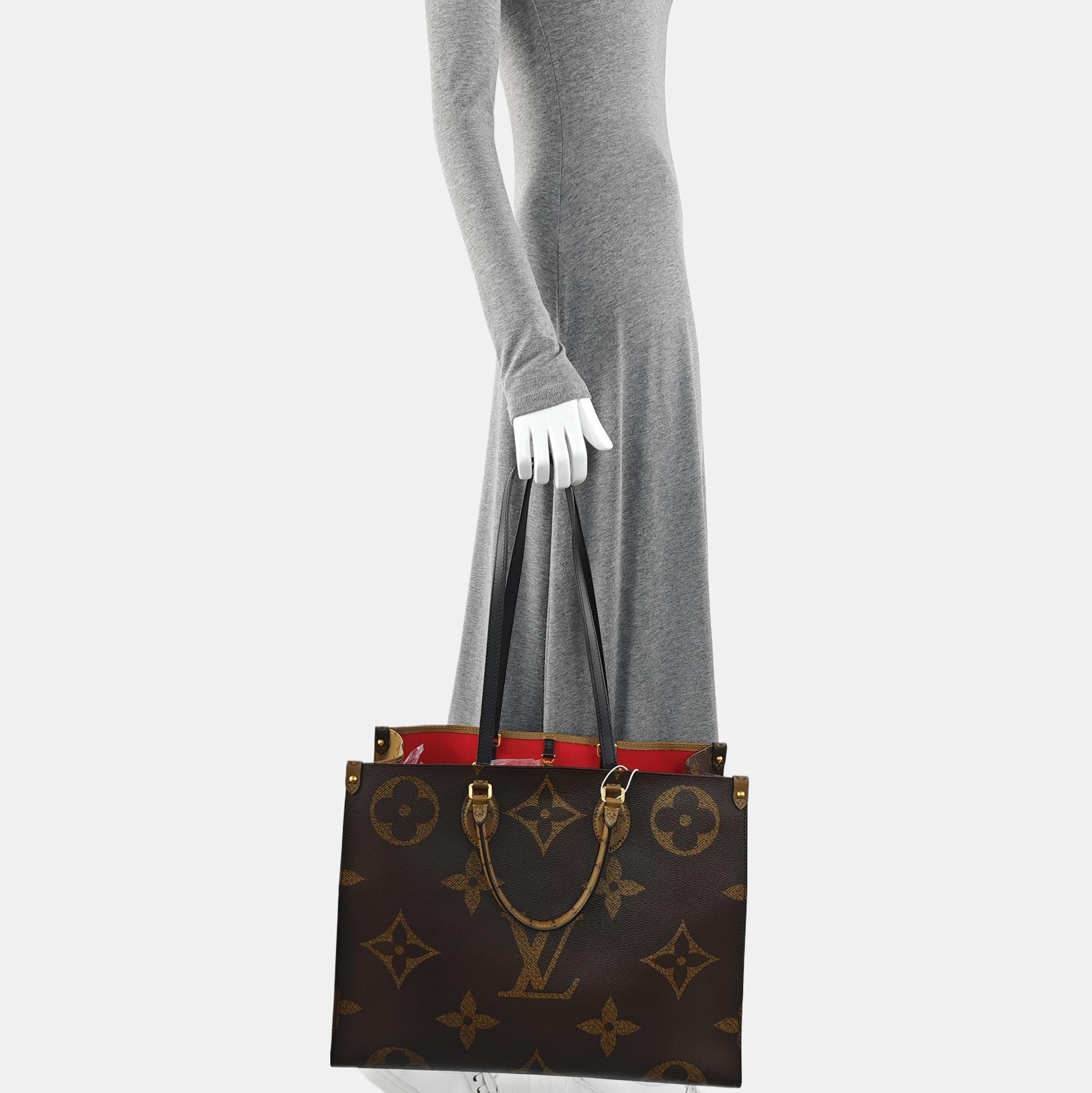 ONTHEGO GM Monogram Coated Canvas Brown