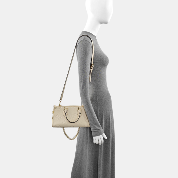 ONTHEGO EAST WEST Monogram Calfskin Beige