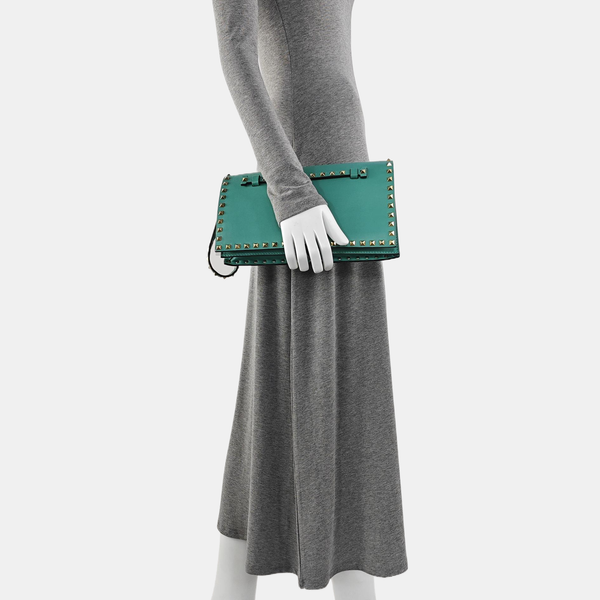 Authenticated pre-owned  Rockstud Lambskin Green - Clutch at Looply
