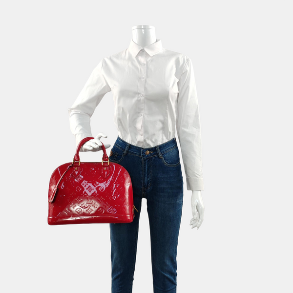 Authenticated pre-owned  ALMA PM Monogram Patent Leather Red - Top Handle Bag at Looply