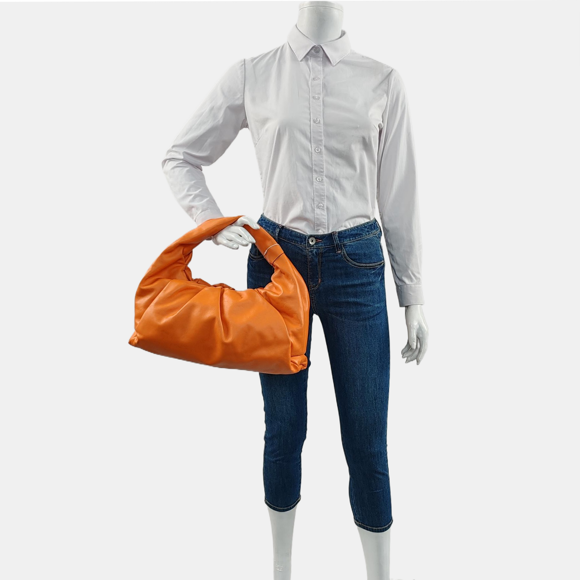 Authenticated pre-owned  The Pouch Calfskin Orange - Top Handle Bag at Looply
