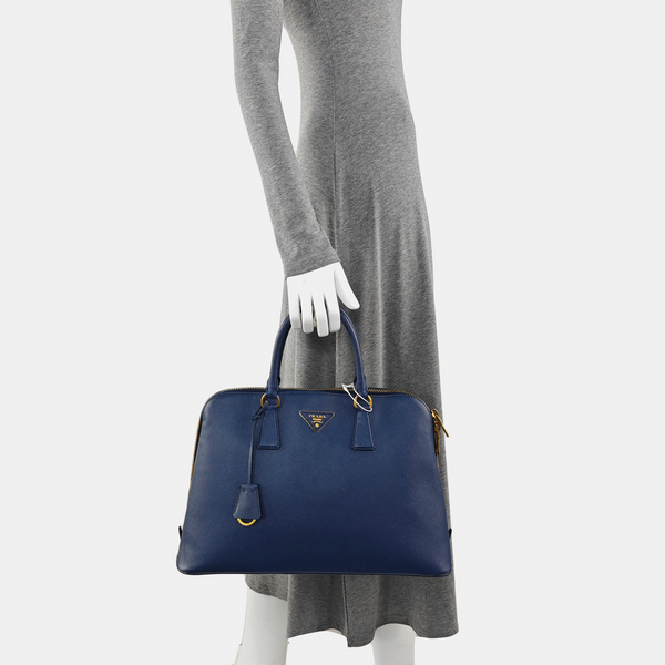 Authenticated pre-owned  Promenade Calfskin Blue - Top Handle Bag at Looply
