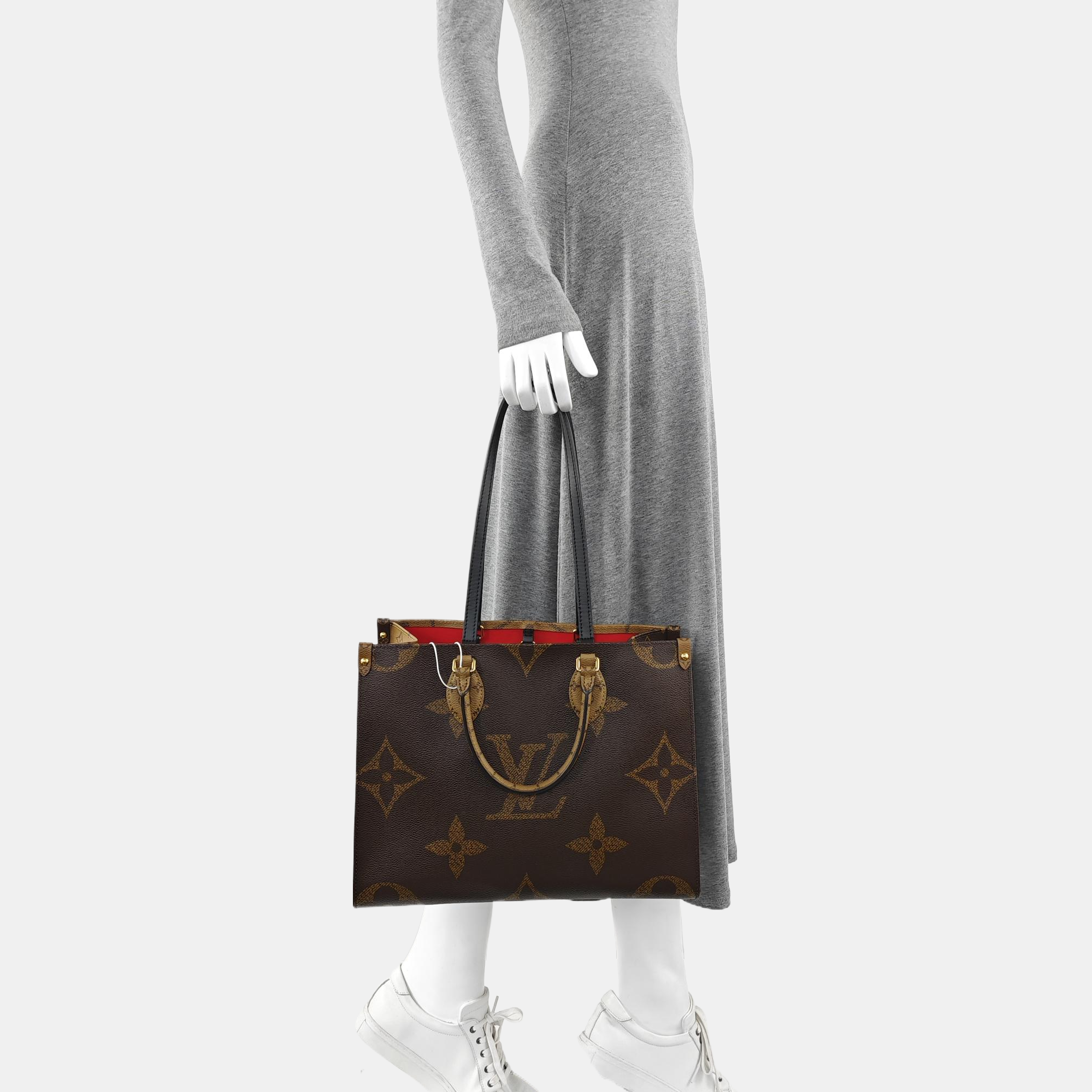 ONTHEGO MM Monogram Coated Canvas Brown