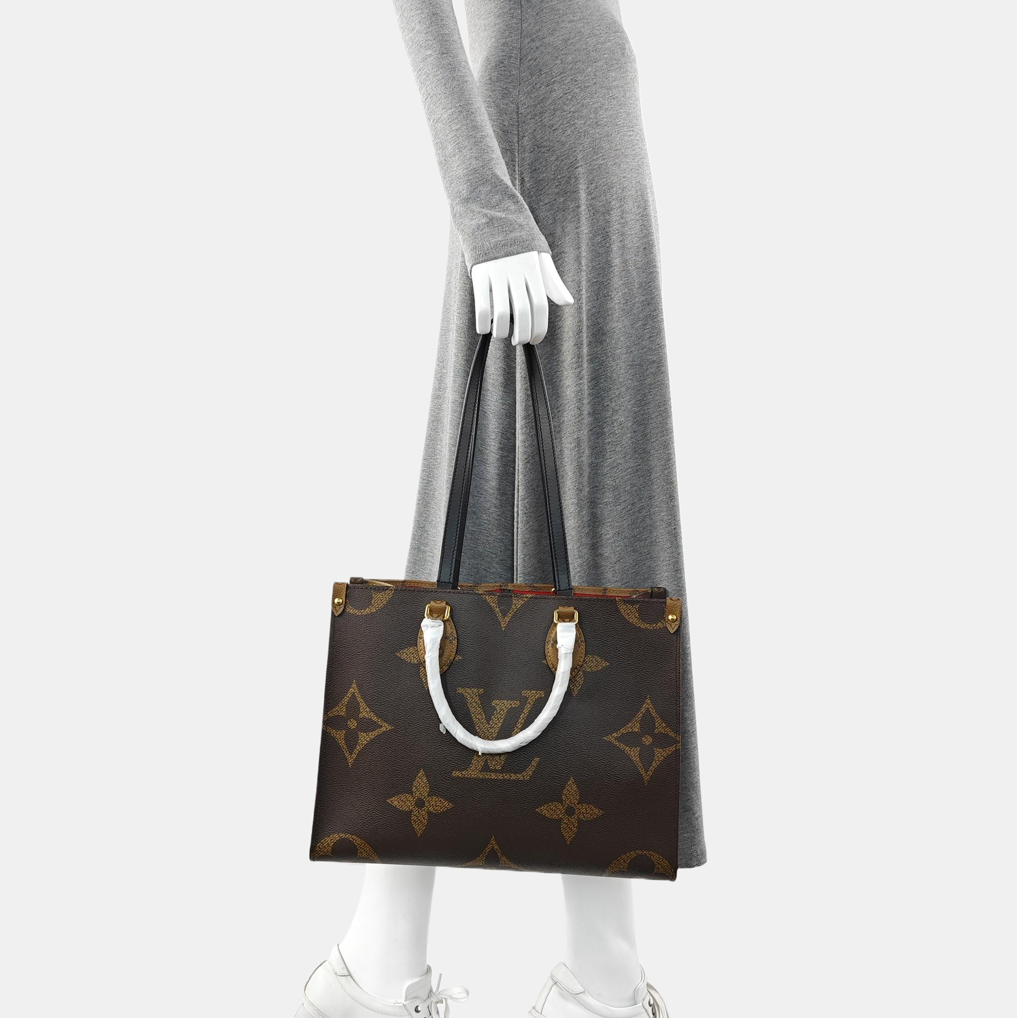 ONTHEGO MM Monogram Coated Canvas Brown