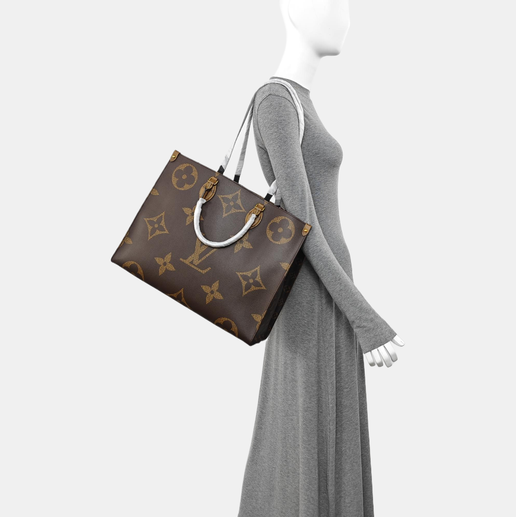 ONTHEGO GM Monogram Coated Canvas Brown