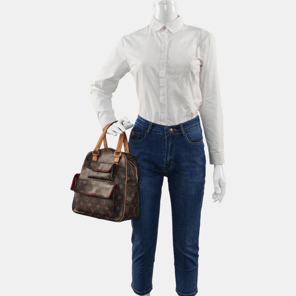EXCENTRI-CITE Monogram Coated Canvas Brown