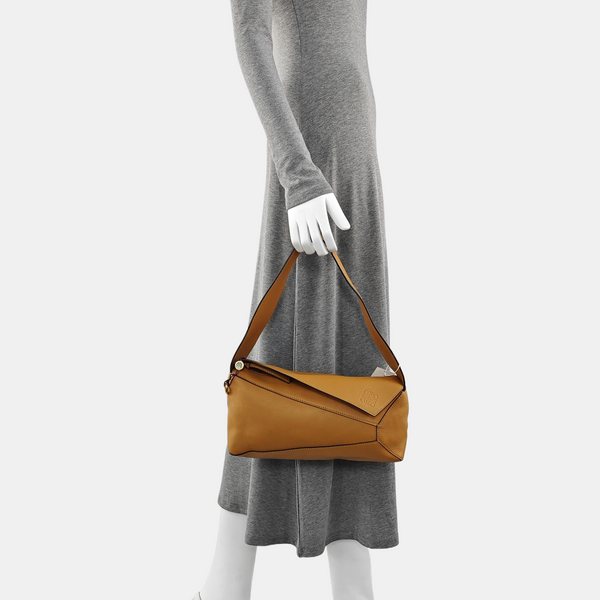 Authenticated pre-owned  Puzzle Hobo Calfskin Brown - Top Handle Bag at Looply