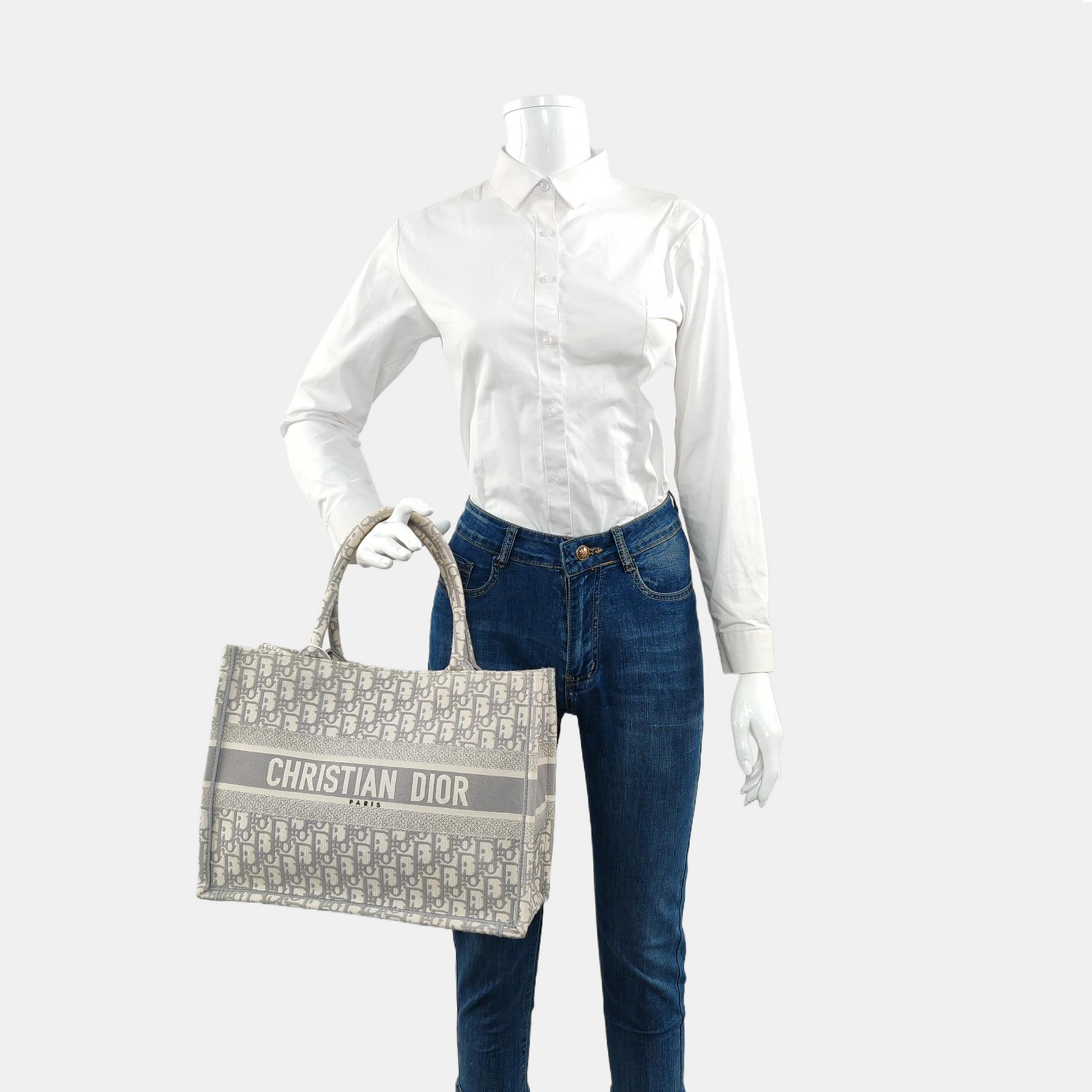 Authenticated pre-owned  Book Tote Medium Oblique Canvas White - Tote Bag at Looply