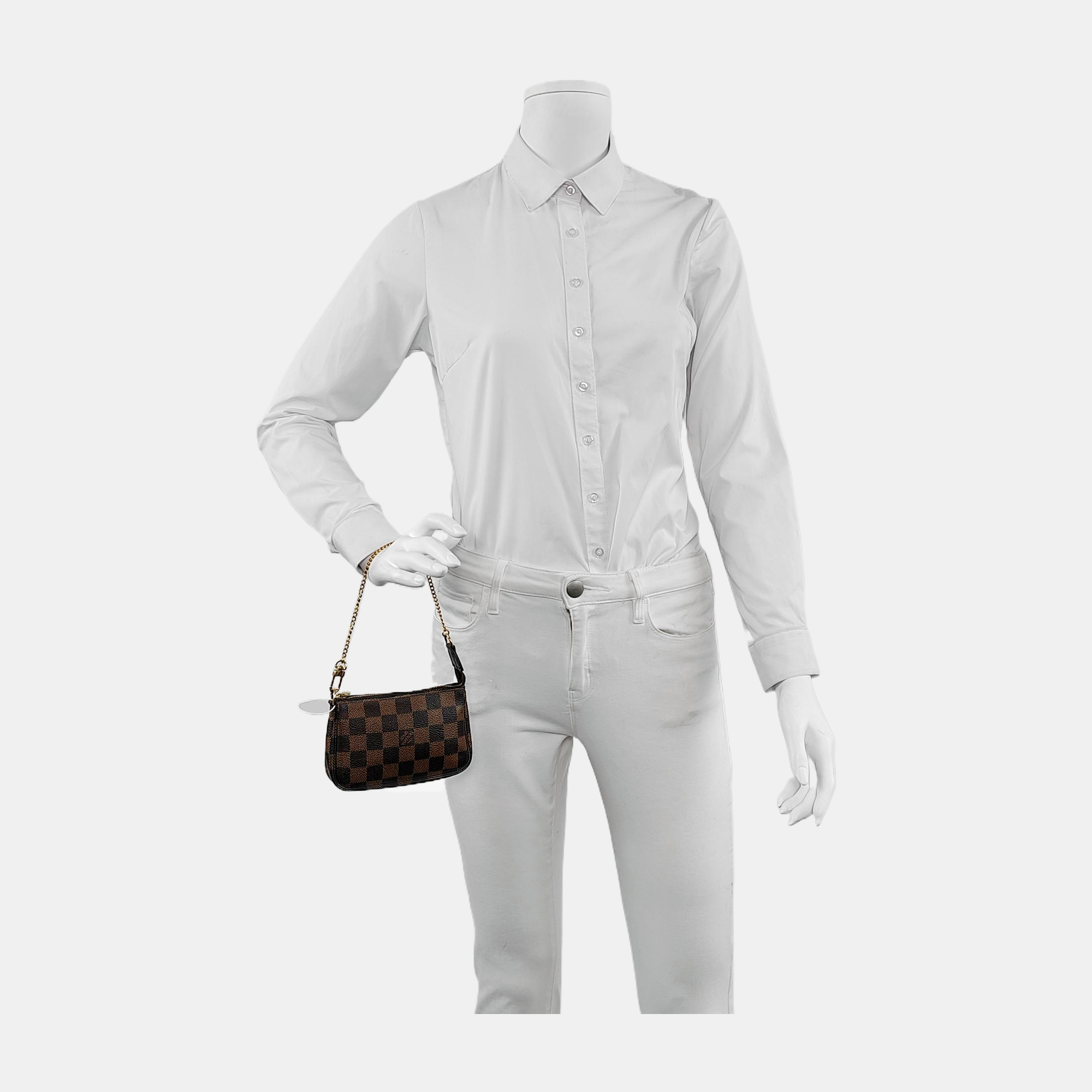 Authenticated pre-owned  ACCESSOIRES Mini Damier Ebene Coated Canvas Brown - Top Handle Bag at Looply