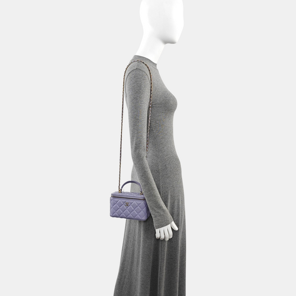 ESTUCHE DE TOCADOR Piel de cordero acolchada Morado