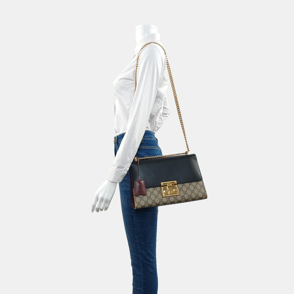 Authenticated pre-owned  Padlock Medium Monogram Coated Canvas Beige - Shoulder Bag at Looply